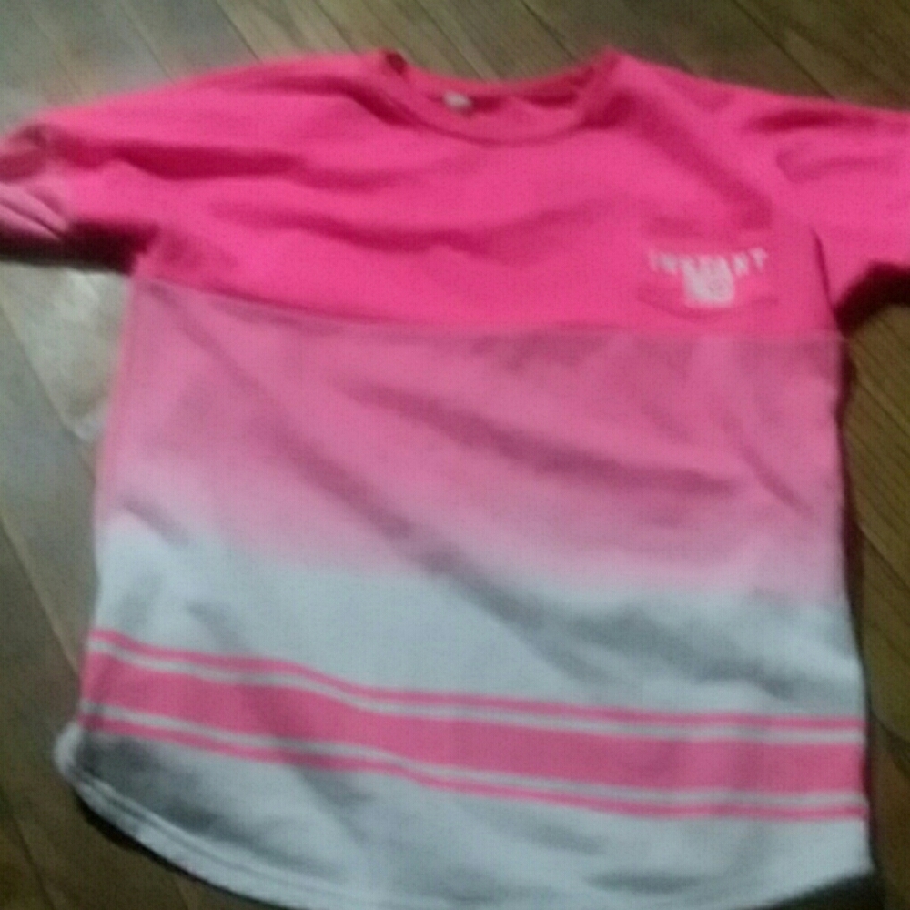 A pink Stella Tweed shirt